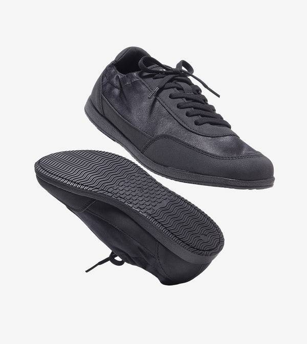 RUSH slim lace-up sneakers for women in onyx black, sole view